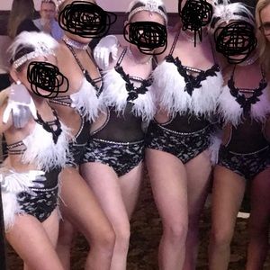 Custom details dance wear dance costume with feathers and crystals. Georgeous.